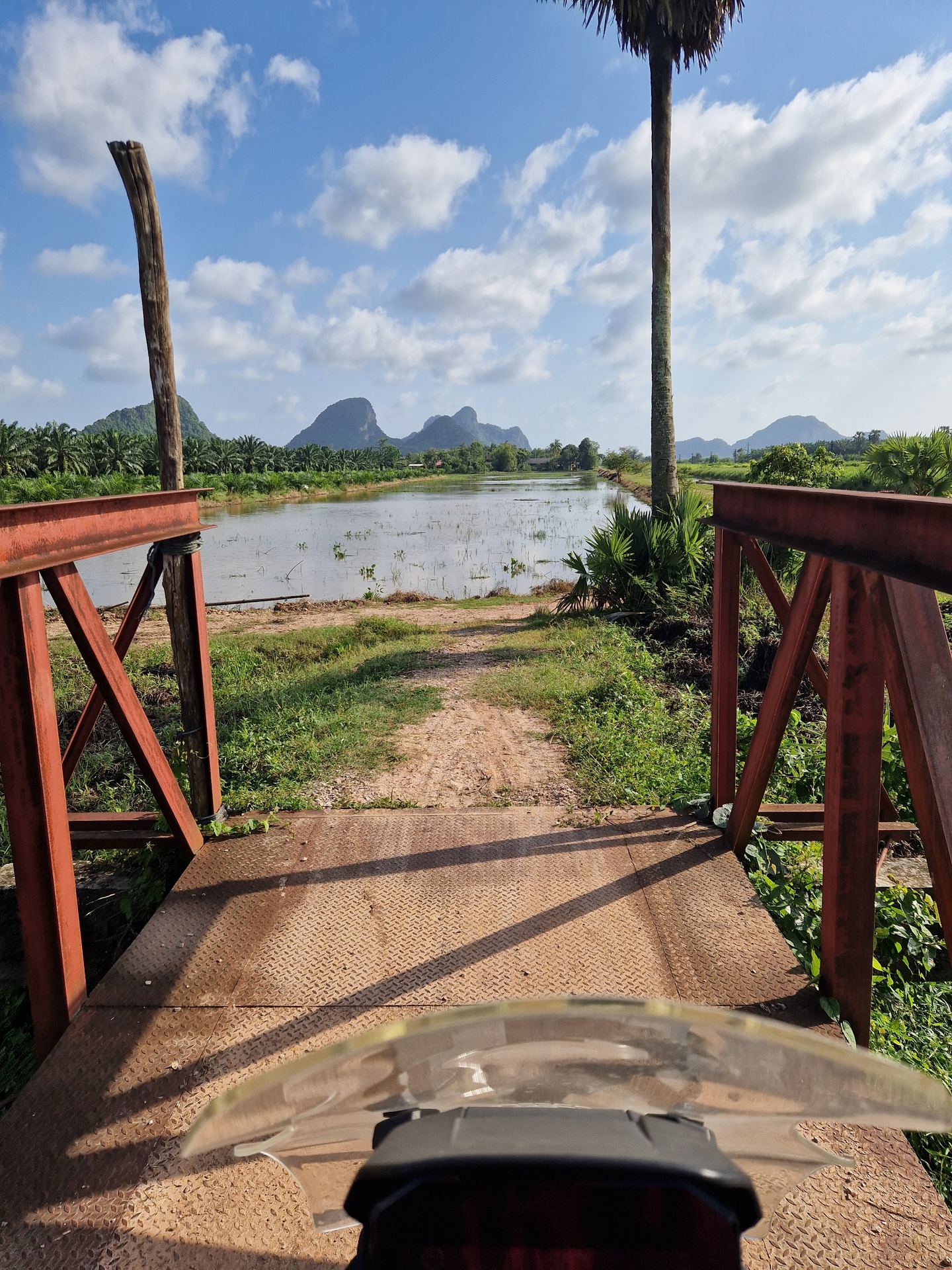 Motorcycle on a bridge crossing in South Thailand